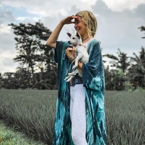 Turquoise boho kimono robe styled over leggings and yoga top