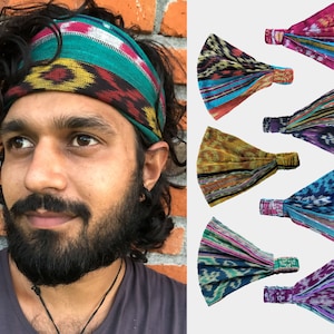 May include: A set of 8 colorful patterned headbands. Each headband is made of a soft, stretchy fabric with a unique ikat design. The headbands are available in a variety of colors, including blue, green, purple, orange, and pink.