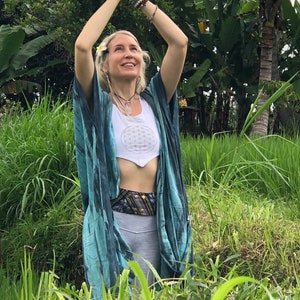 Turquoise festival kimono robe styled as cover up after yoga or beach look