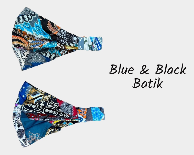 May include: Two blue and black batik fabric headbands. The fabric is a patchwork of different patterns and colors. The headbands are elastic and can be worn in a variety of ways.