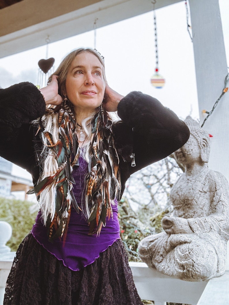 Boho festival outfit featuring long feather drop earrings handmade natural statement accessory