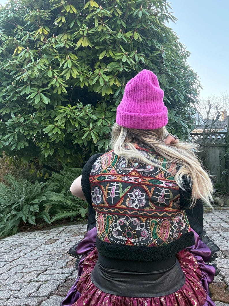 Handmade black cropped hippie vest with antique Indian textiles, styled look