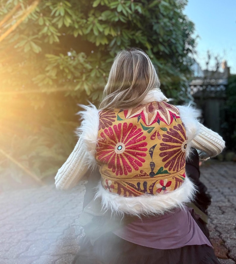 One-of-a-kind yellow boho vest with colorful vintage textiles and faux fur trim