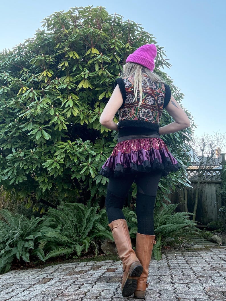 One of a kind black faux fur vest with antique Indian textile embroidery, back view