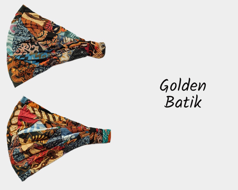 May include: Two colorful fabric headbands with a batik pattern in shades of blue, red, orange, and brown. The text "Golden Batik" is written in black below the headbands.