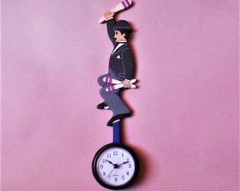 Charlie Chaplin On A Unicycle Wall Clock