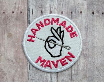Handmade Maven Patch, Crafty Merit Badge, Embroidered White Canvas with Hand Holding Needle and Pink Text, Choice of Finding, Made in USA