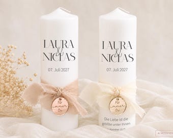 High-quality wedding candle "Laura&Niclas" with ribbon and pendant in acrylic, available in cream/gold or nude/rose gold.
