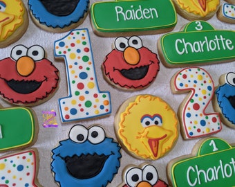24 Kids Characters First Second Third Birthday Celebration cookies, Colorful monsters face theme party favors, vintage street sign design.