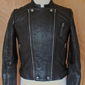 VINTAGE LUCKY Brand woman&#39;s black Leather Jacket Moto zippers quilted rib sleeve buckle SIZE small May never have been worn-please see below