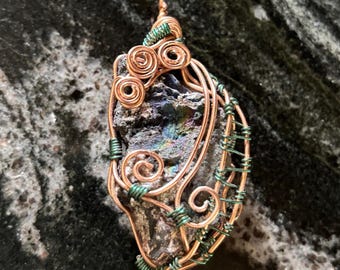 Hand Mined & Crafted Pendant/Necklace. Iridescent Hematite. 2 1/2" x 1 1/4". Copper Wrap. Leather Cord. Artisan Jewelry. Georgia/USA.