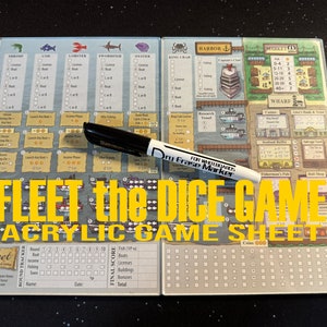 May include: A dry-erase game sheet for the board game "Fleet the Dice Game". The sheet is made of clear acrylic and has a nautical theme. It includes spaces for tracking scores, rounds, and other game information. A dry-erase marker is lying on top of the sheet.