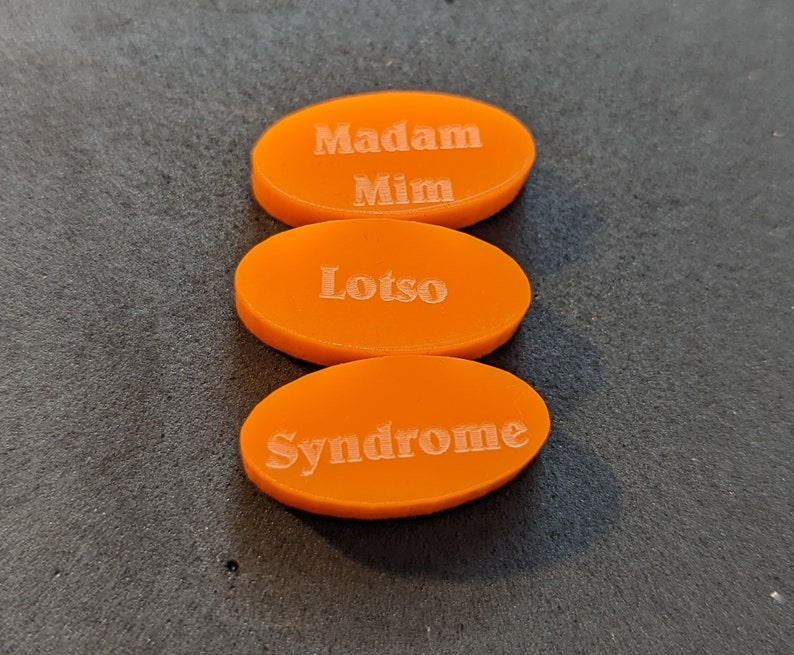 Villain random tokens for Disney Villainous Bigger & Badder: Madam Mim, Lost, and Syndrome.