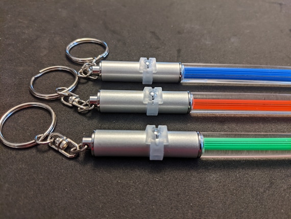 Light Saber LED Keychain for Star Wars Fans: Red, Green, Blue, or White