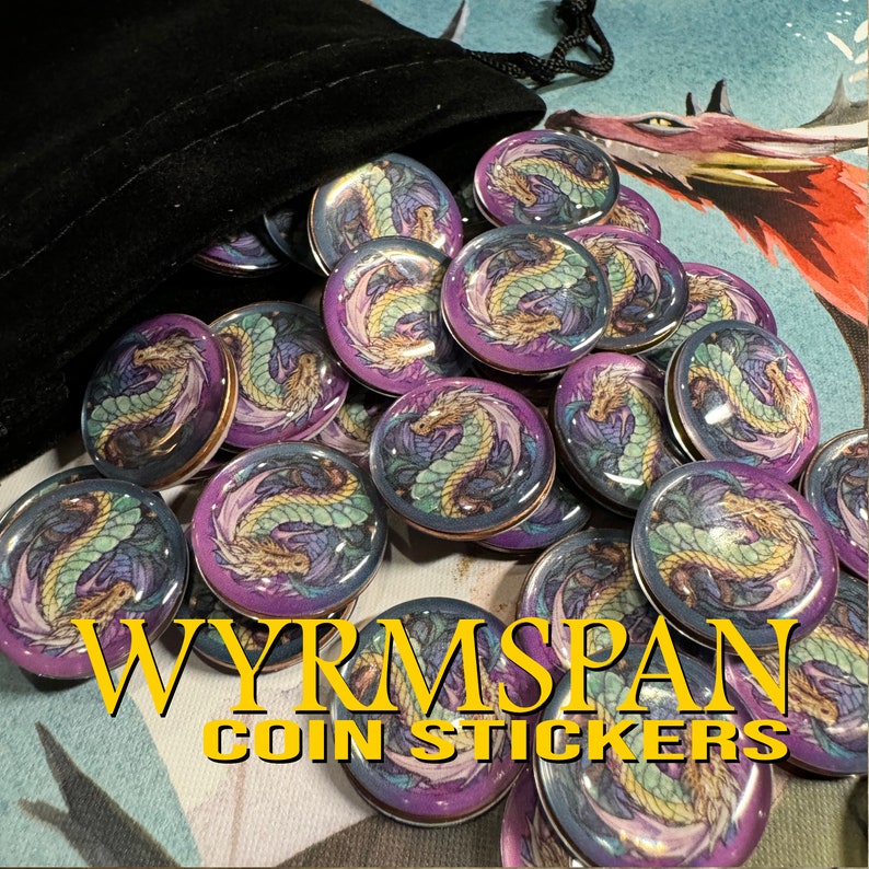 Wyrmspan dragon coins coming out of a black velvet bag. This is the coin sticker set by LaserLand.