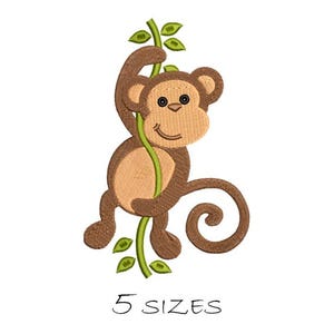 May include: Embroidered monkey design in shades of brown, tan, and green, hanging from a vine. The monkey has a smiling face and is holding onto a green vine with leaves. The text "5 SIZES" is below the monkey.