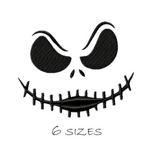 May include: Black and white embroidery design of a stitched-up Halloween monster face with a wide grin and two eyes. The design is available in six sizes.
