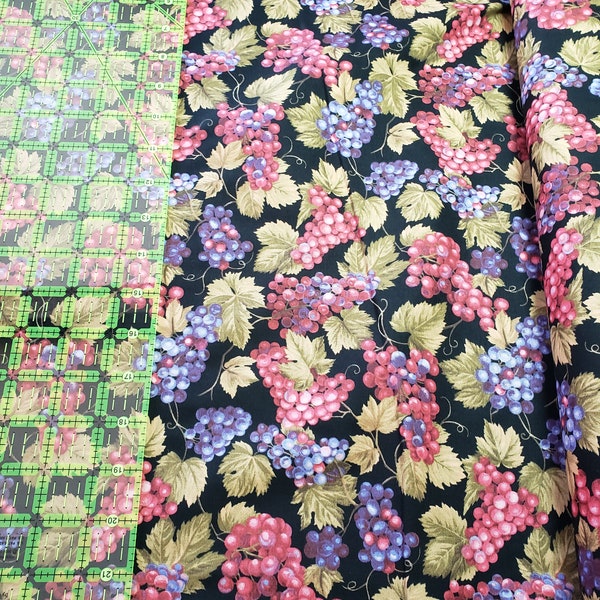 Fabric, Premium Cotton, Grapes, Leaves, Vines, Black Background, Purple, Red, Green. Sold in 1/2 Yard Increments.