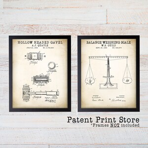 May include: Two vintage patent prints in black frames. The left print shows a hollow headed gavel with the text "Hollow Headed Gavel A.J. Quayle July 24, 1956 No. 8,755,833". The right print shows a balance weighing scale with the text "Balance Weighing Scale W.B. Guild Sept. 29, 1885 No. 226,975".