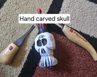 Hand carved halloween skull with black candle. Rare only one made for the season.