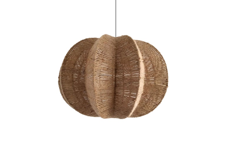 May include: A round, woven pendant light fixture made of natural rope. The light has a light brown color and a unique, folded design.