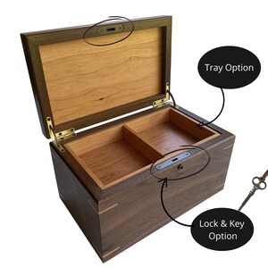Interior view of handcrafted walnut keepsake box with optional cherry tray and lock & key upgrade, showing lock hardware placement.