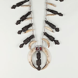 Dayak chief amulet necklace guardian figure pectoral late 19th C. Borneo Indonesia Southeast Asia