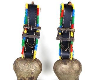 Pair of vintage Swiss forged iron cowbells with floral belt vintage alpine folk art 3.5 inches wide each