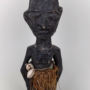 Yoruba culture figure Ere Ibeji wooden female memory twin figure, Nigeria, West Africa late 19th C.