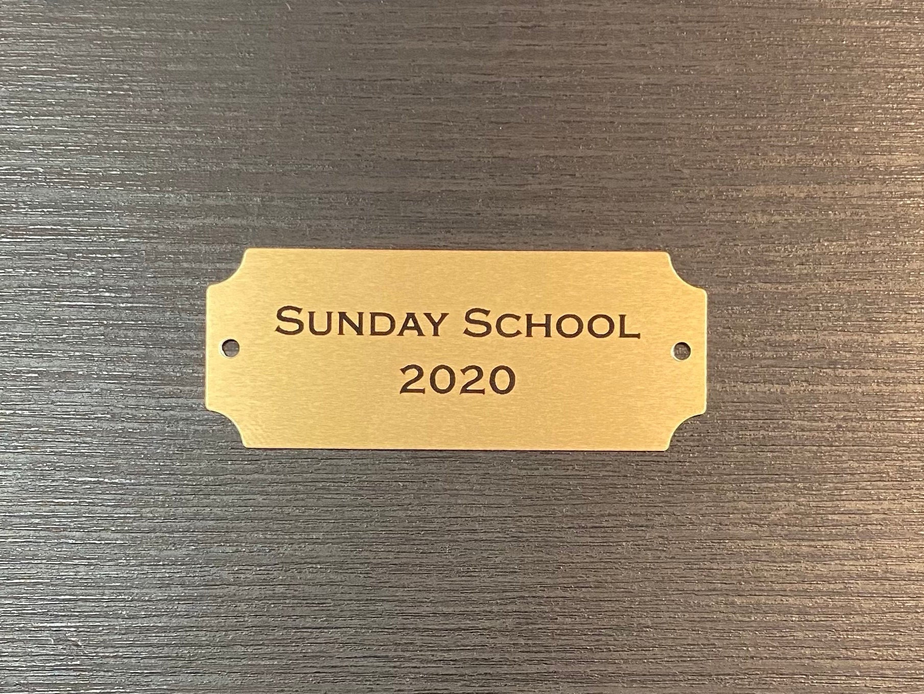 thumbnail interactive-video image 1 of Custom Laser Engraved Brass Color Name Plate - 2x6 Inch Rectangle Plaque For Gift, Art, Label 1 of 4