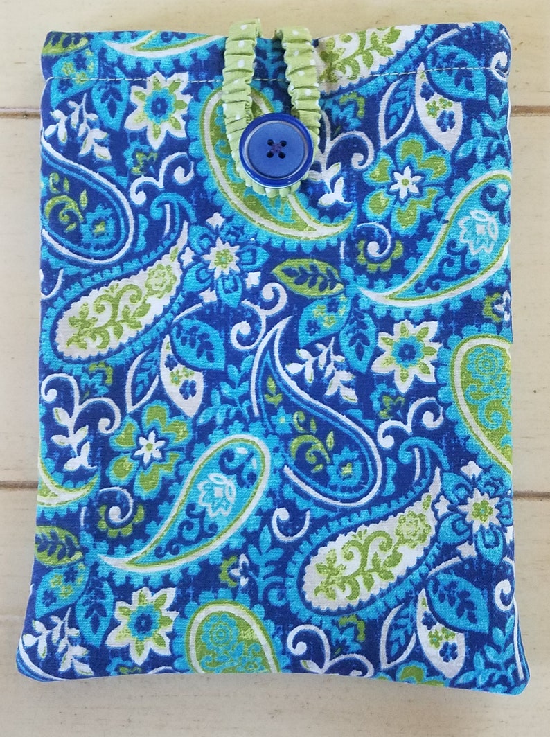 May include: A blue and green paisley patterned fabric pouch with a green button closure.