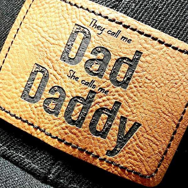 They Call Me Dad She Calls Me Daddy - Black mesh trucker hat with faux leather patch