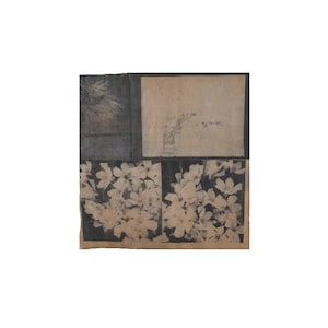 May include: A square textile piece featuring a collage of printed imagery. The top section displays a textured abstract pattern and a faint botanical sketch. The bottom half is dominated by two panels of repeating white floral motifs on a dark background.