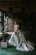 Wedding dress from Inga Ezergale design Rose Collection product logo
