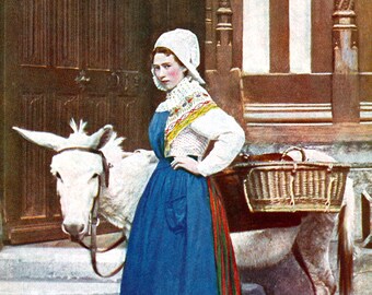 A Lady and donkey not to be messed with - a 1920s coloured photo from Normandy which captures real strength of character