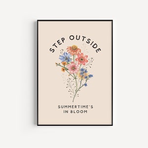 May include: A printable poster with a floral illustration and the text "Step Outside Summertime's in Bloom". The flowers are pink, blue, yellow, and orange.
