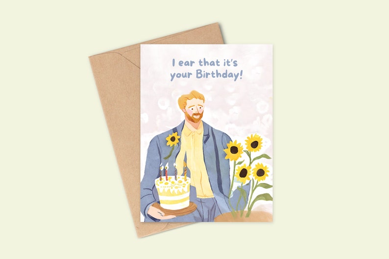 May include: A birthday card featuring a cartoon illustration of a man holding a yellow cake with lit candles. The card has the text "I hear that it's your Birthday!" in blue lettering.