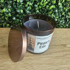 PIRATES LIFE Disney Inspired Candle 12oz Jar Soy Wax Main Street Melts Candle Co. Magic Theme Park scent of the Caribbean Attraction Ride