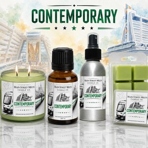 May include: A collection of Main Street Melts Candle Co. products including a light green two-wick candle, an amber glass dropper bottle, a silver spray bottle, and a package of light green wax melts, all featuring a monorail and Contemporary label.