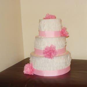 Light pink wedding cake pinata. Birthday cake pinata.