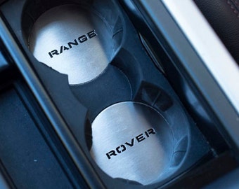 Range Rover EVOQUE 2011-2018 Cup Holder Emblem Cover - 2pcs Stainless Steel Plate Disc Coaster Dashboard Dash Trim Kit Car Accessories