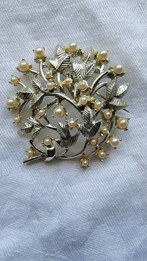 Signed Coro faux pearl brooch