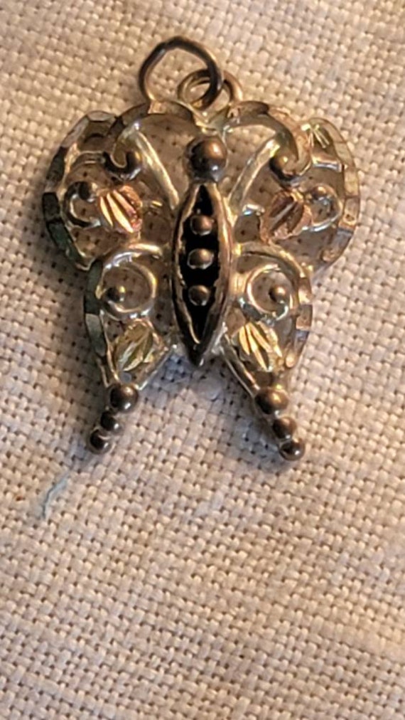 Sterling and 12K Butterfly pendant