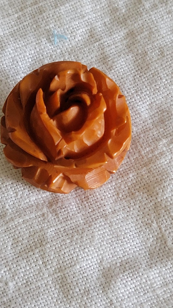 Vintage Bakelite carved rose pin