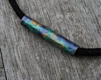Hand painted copper bead on leather cord