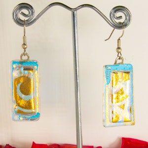 Ocean blue with Swirls of 24 Kt gold, handmade dichroic glass jewelry.