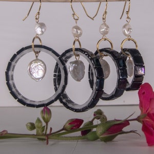 Handmade fused glass earrings, Black Iridescent Hoops in 3 sizes, real Coin Pearls, and a small accent pearl drops from erring wire.2"-1"