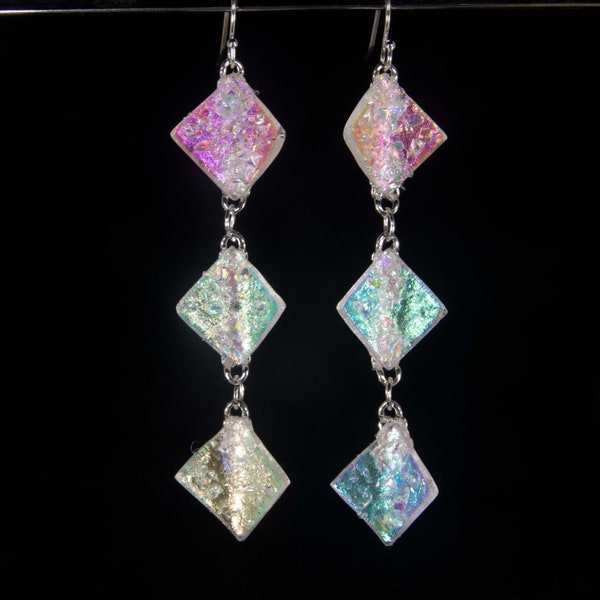 Textured Dichroic triplet waves, handmade dichroic glass earrings, glass earrings, that reflect multi colors off of the tiny glass bits.