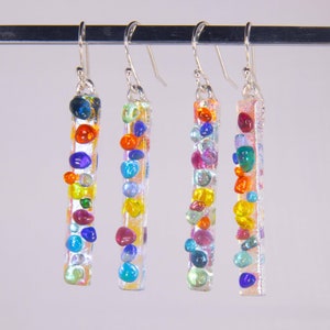 Colored Drops, Handmade Dichroic glass earrings, glass earrings, with  rainbow colored glass drops, light reflects through the many colors.