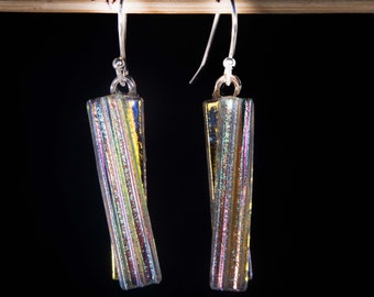 Handmade dichroic glass jewelry, single twist of Dichroic glass with grooves over clear rainbow dichroic.. 1 1/4 x 1/4